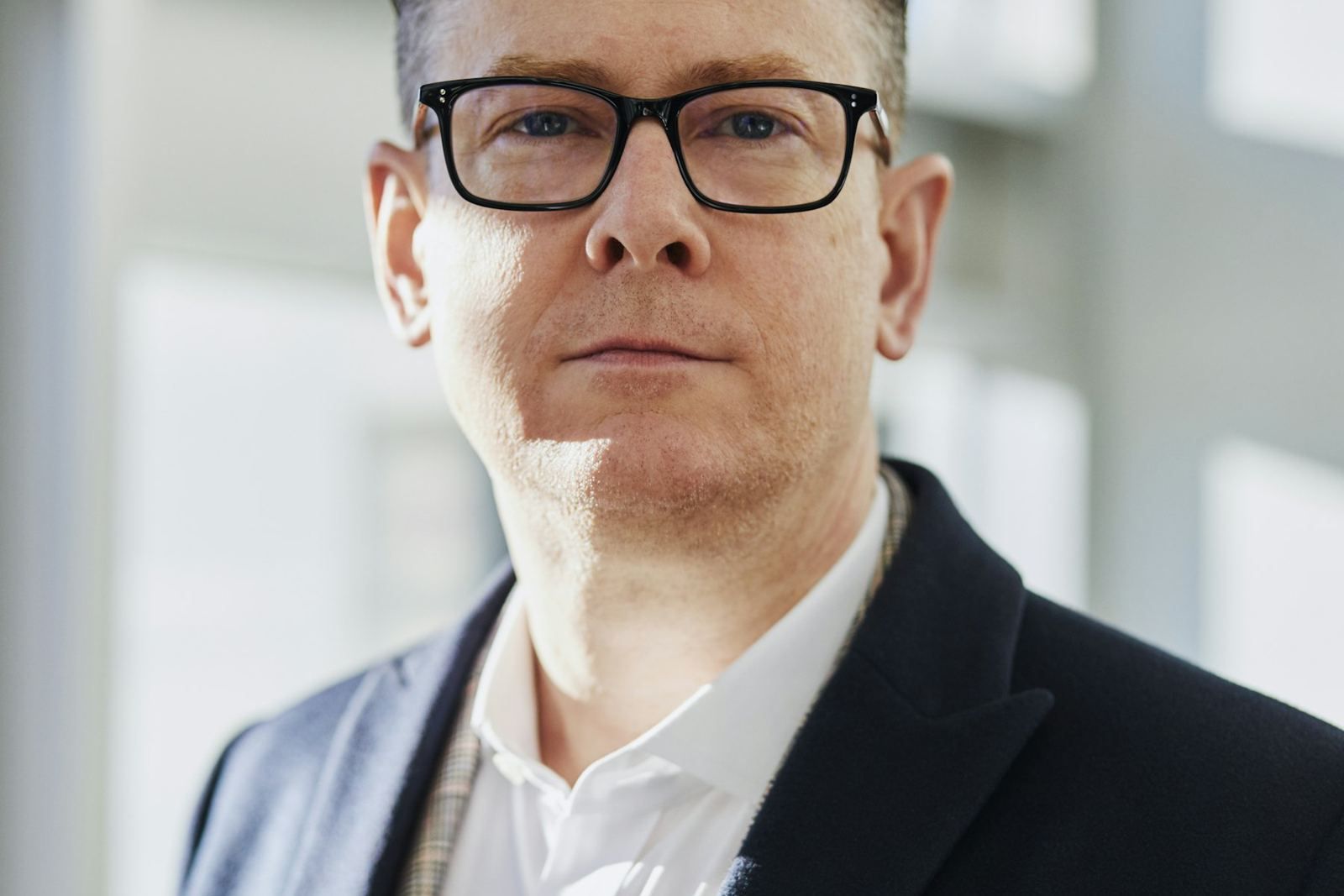 A senior executive in a light office
