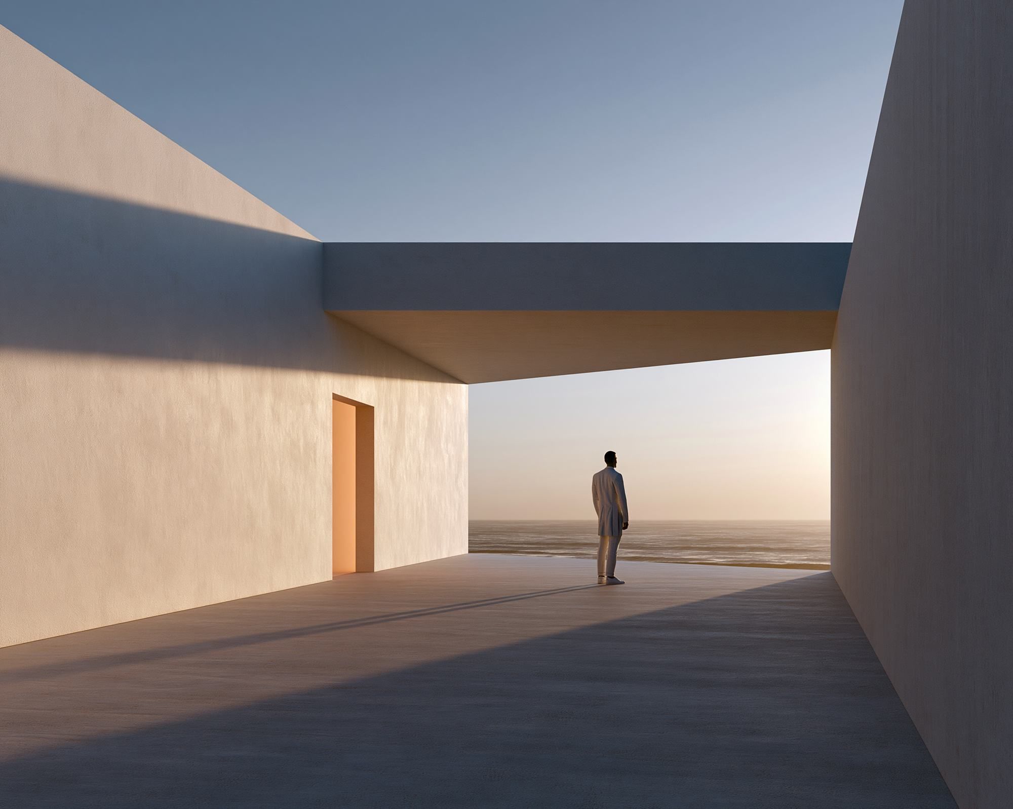 A single figure on a terrace at the edge of the sea, between a warm wall and open sky